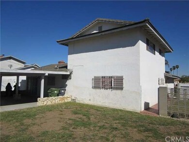 Rear of home with large yard