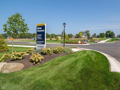 view of property's community with a yard