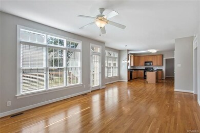 Family room view into eat-in kitchen