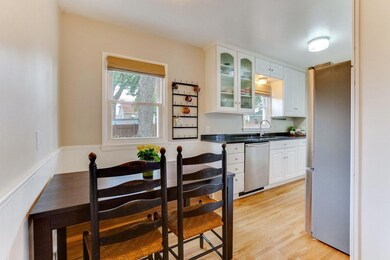 The sellers built a banquet to accommodate more people in the dining area.  WOOD FLOOR INSTALLED IN THE KITCHEN (2022) to match the main floor.  Very SHARP!