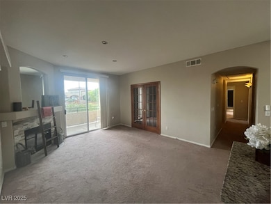 FAMILY ROOM PHOTO SHOWING HALLWAY TO BEDROOMS