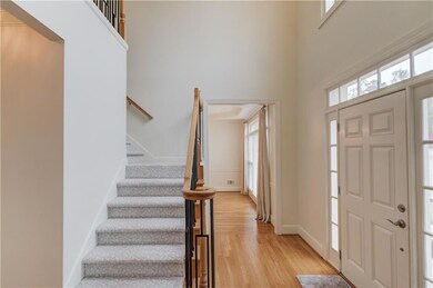 Foyer entrance featuring plenty of natural light, 