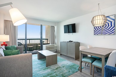 Living area with light wood-style flooring and an 