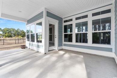 View of patio with fence