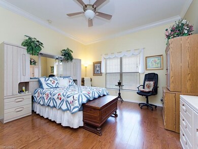 Large master with wood flooring.  Overlooks the po