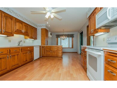 Large Beautiful kitchen with custom Maple cabinets