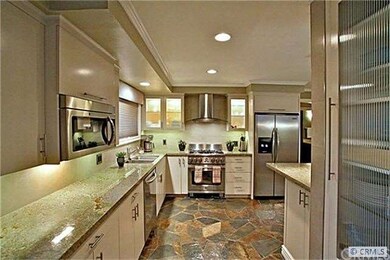 Custom cabinetry, stainless appliances and LED lig