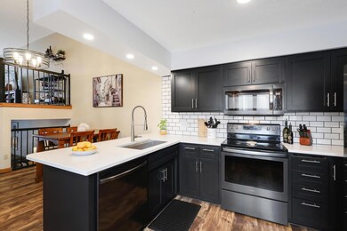 Newly Remodeled Kitchen with Quartz Countertops and New Appliances