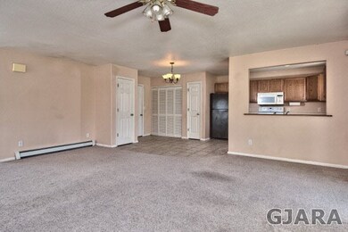 The living room gives way to the dining area, and 