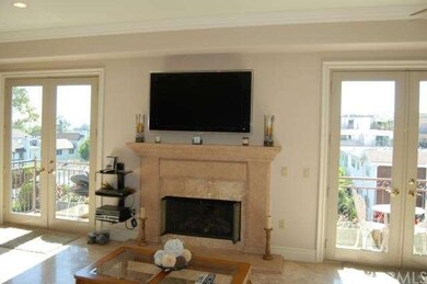 Great room fireplace with travertine surround, two