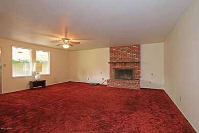HUGE family room w/cozy brick fireplace