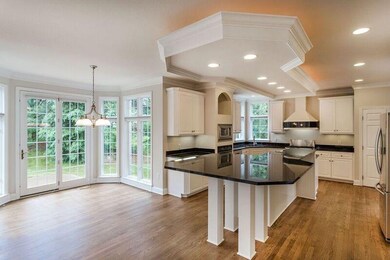 Breakfast area offers doors to the backyard and pa