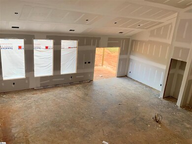 3 massive windows in the family room flood it with