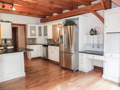 Kitchen has granite countertops and stainless stee