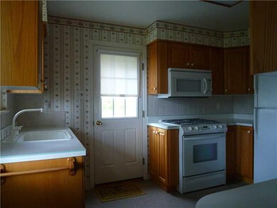Kitchen. UPDATED KITCHEN COUNTER TO THE FRONT RIGH