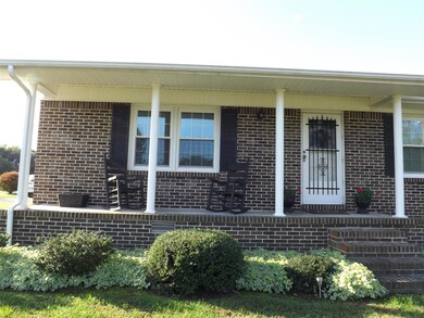 A rocking chair front porch is another great feature of this home.