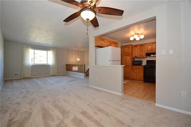 Dining flows from the kitchen to the family room