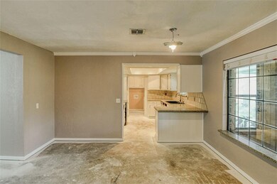 Living room looking into kitchen