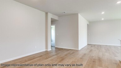 Unfurnished room with recessed lighting and light wood finished floors