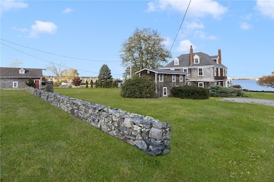 Home, cottage, and two additional outbuildings are on this lovely property.