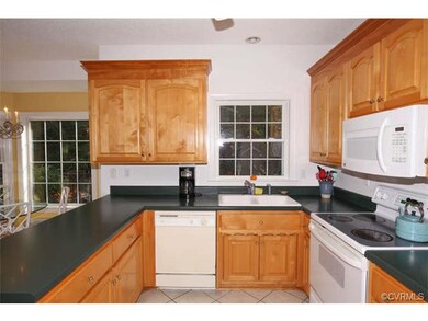 Very Functional Kitchen and plenty of Cabinets.