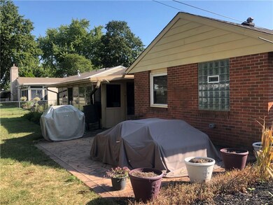 Stamped concrete patio and an enclosed p