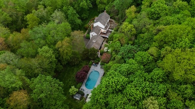 Property includes heated pool and hot tub, private