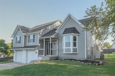 300 W Laredo Trail, Raymore, MO 64083 - photo 2
