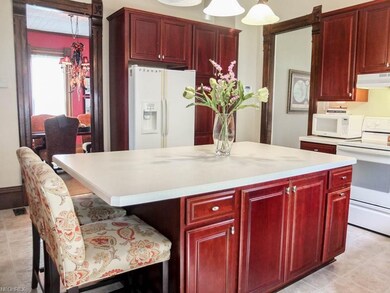 Kitchen has a pantry with swing out shelves.