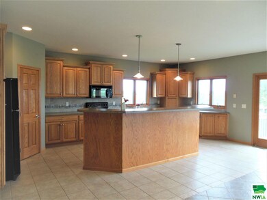 Large island that fits bar stools for side bar din