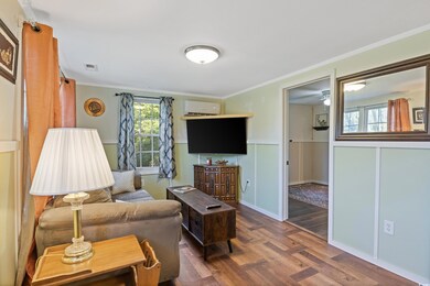 Living room featuring dark hardwood / wood-style f