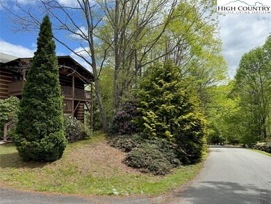 Paved driveway and paved subdivision roads provide