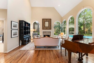 This elegant formal living room features high ceil