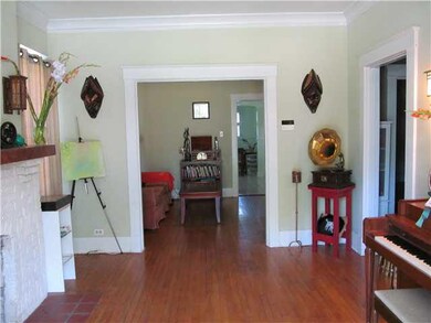 The 13 x 12 living room has beautiful hardwood flo