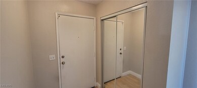 Doorway featuring light wood-style floors