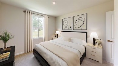 Bedroom with light carpet and recessed lighting