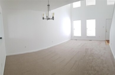 Living/combo area with new carpeting, new lighting