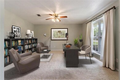 Front room with virtually staged furniture. This r