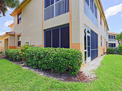 View of home's exterior with stucco siding and a l