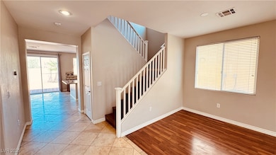 Stairs featuring baseboards, recessed lighting, an