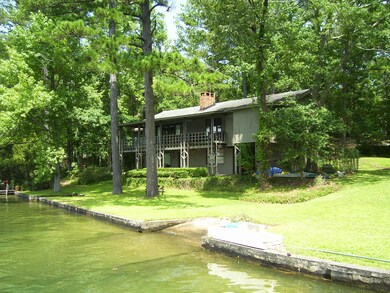 Note the boatramp and flat yard at water