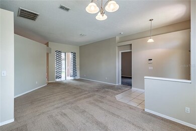 Front Formal space that opens to kitchen, pool wit