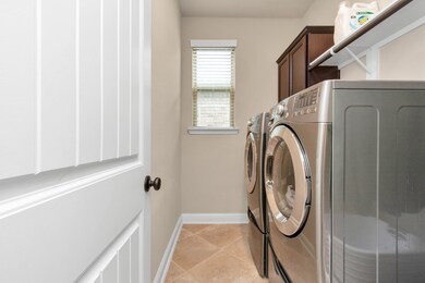 Laundry room located downstairs