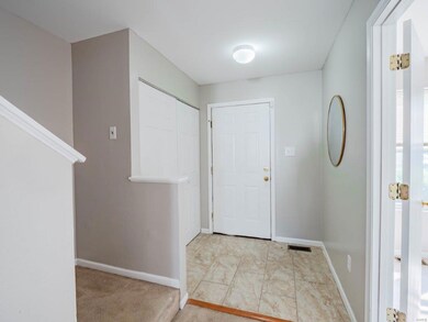 Front entry foyer with large coat closet.