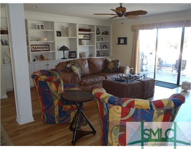 Living Room. The living room has custom built in b