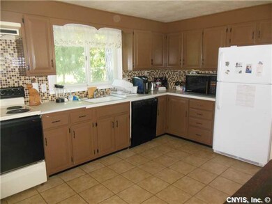 Kitchen. Eat-in kitchen with new ceramic flooring 