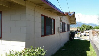Exterior side elevation of main house from back ya