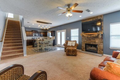Open floor plan to dining area and kitchen.