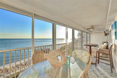 Screened Lanai with view of water and beach, plenty of natural light