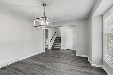 Dining Room with new two tone paint, new flooring 